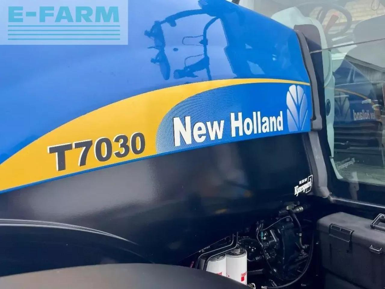 New Holland t 7030 - Tractor: foto 2 New Holland t 7030 - Tractor: foto 2