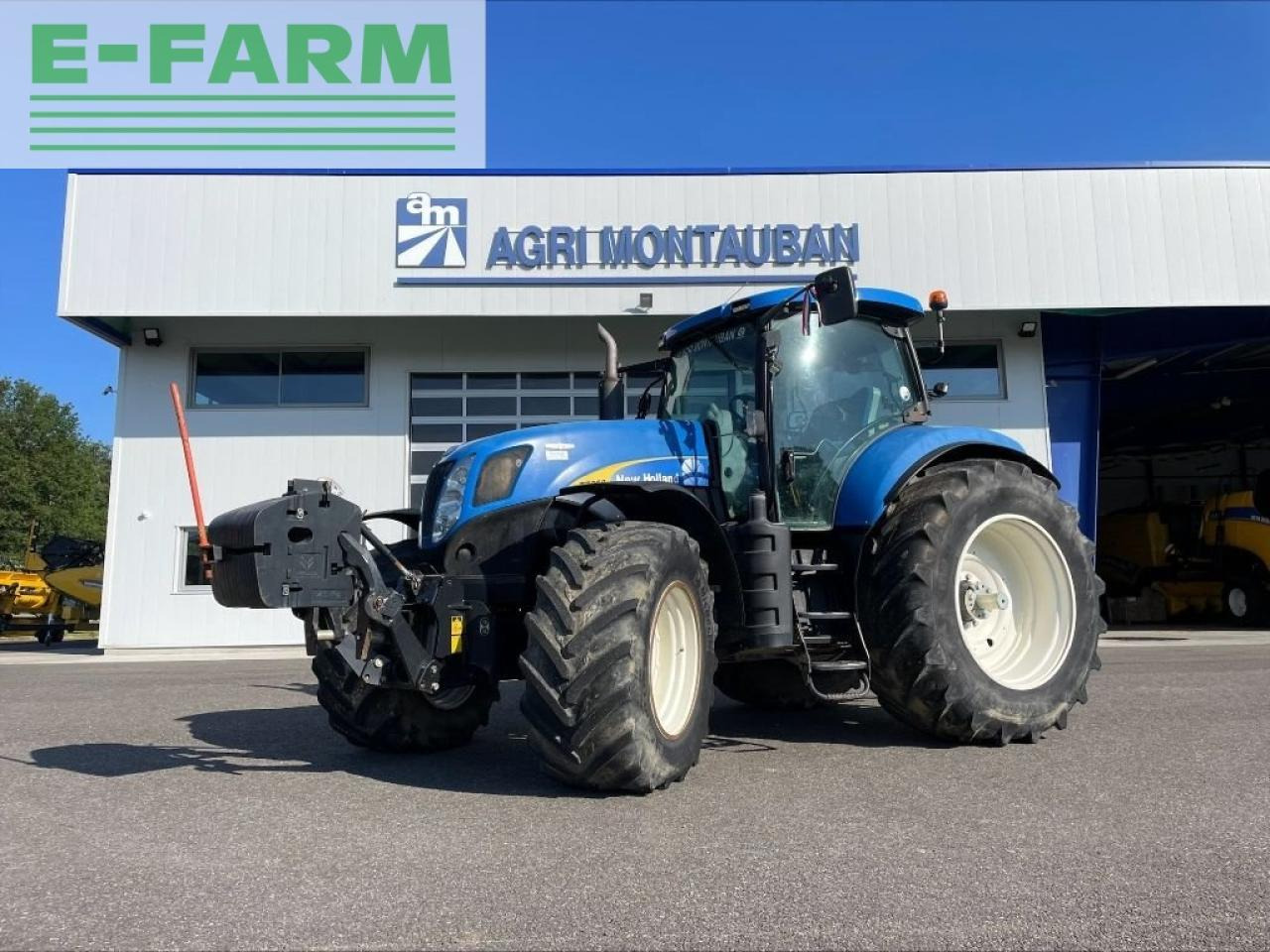New Holland t 7050 - Tractor: foto 1 New Holland t 7050 - Tractor: foto 1