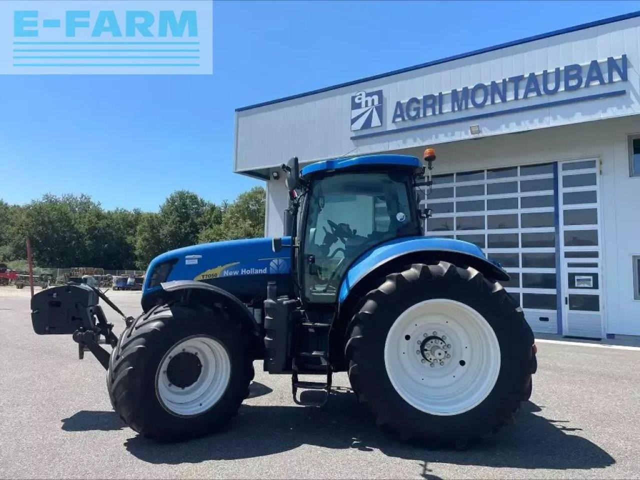 New Holland t 7050 - Tractor: foto 4 New Holland t 7050 - Tractor: foto 4
