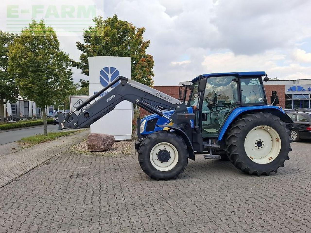 New Holland t5050 - Tractor: foto 1 New Holland t5050 - Tractor: foto 1