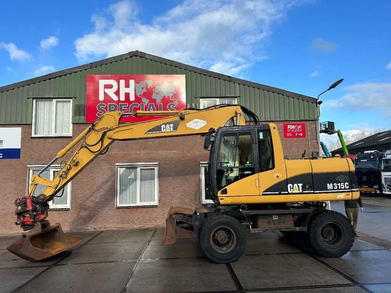 Caterpillar M315C WITH ROTOTILT, CE - Excavadora de ruedas: foto 1 Caterpillar M315C WITH ROTOTILT, CE - Excavadora de ruedas: foto 1
