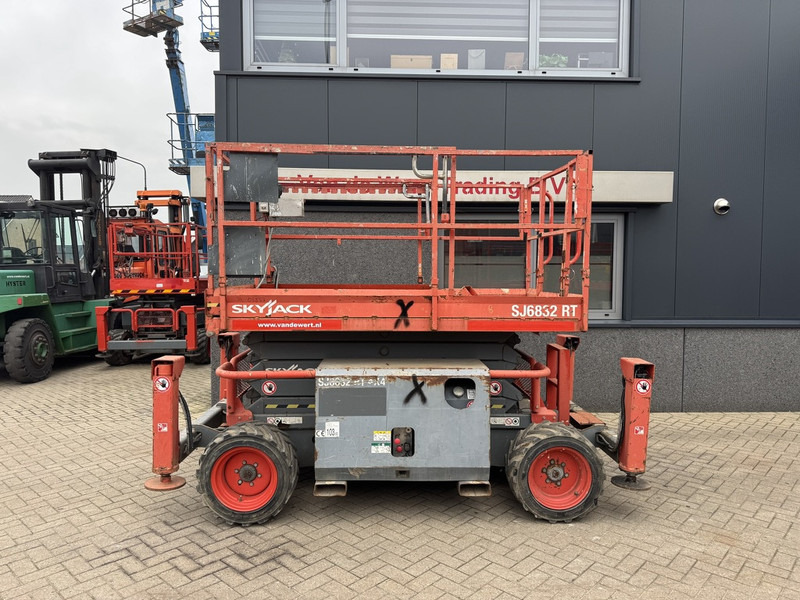 Skyjack SJ 6832RT Schaarhoogwerker / Scissor / Arbeitsbuhne 2015 4X4 Kubota Diesel 12M Werkhoogte - Plataforma de tijeras: foto 1 Skyjack SJ 6832RT Schaarhoogwerker / Scissor / Arbeitsbuhne 2015 4X4 Kubota Diesel 12M Werkhoogte - Plataforma de tijeras: foto 1
