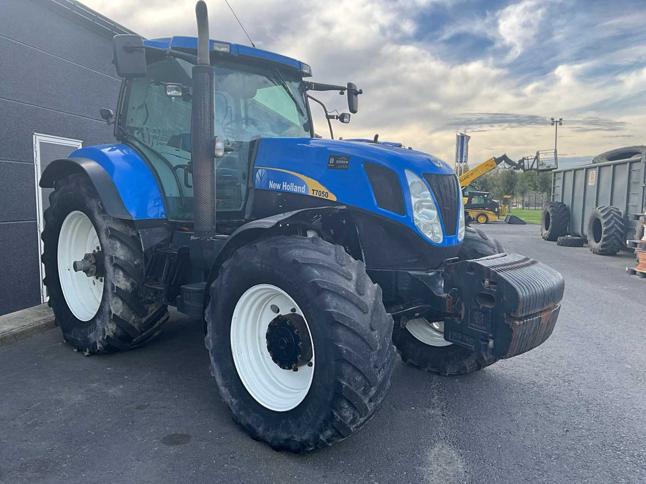 New Holland T7050 - Tractor: foto 3 New Holland T7050 - Tractor: foto 3