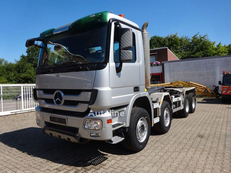 Mercedes-Benz Actros 3244 - Hook lift truck 8x4 - Camión multibasculante, Camión grúa: foto 1 Mercedes-Benz Actros 3244 - Hook lift truck 8x4 - Camión multibasculante, Camión grúa: foto 1