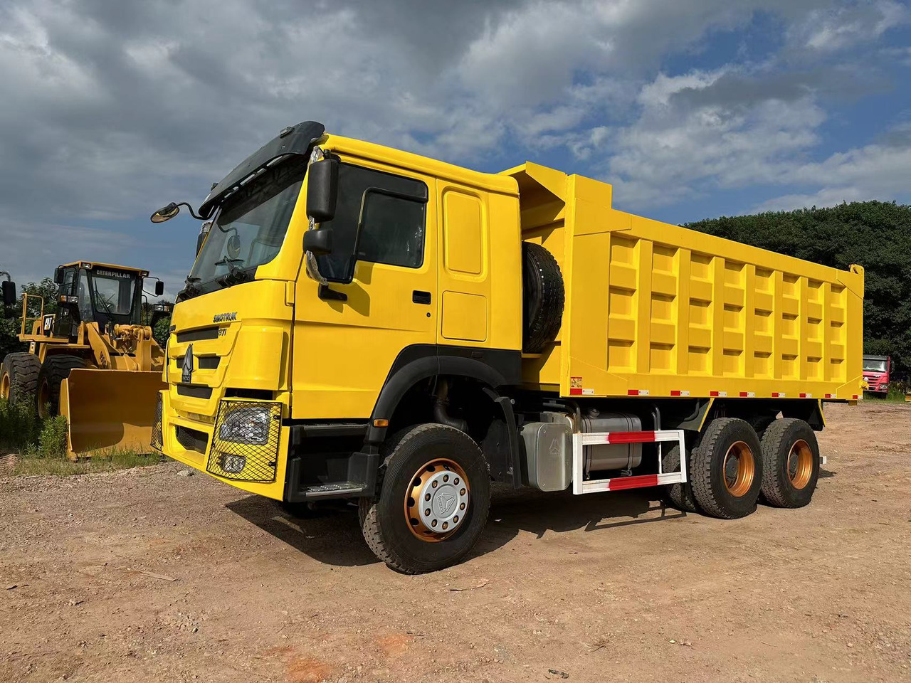 SINOTRUK Howo 371 Dump truck - Camión volquete: foto 2 SINOTRUK Howo 371 Dump truck - Camión volquete: foto 2