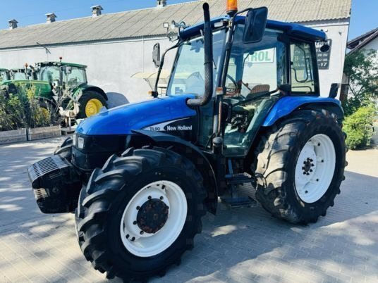 New Holland TL90 - Tractor: foto 1 New Holland TL90 - Tractor: foto 1