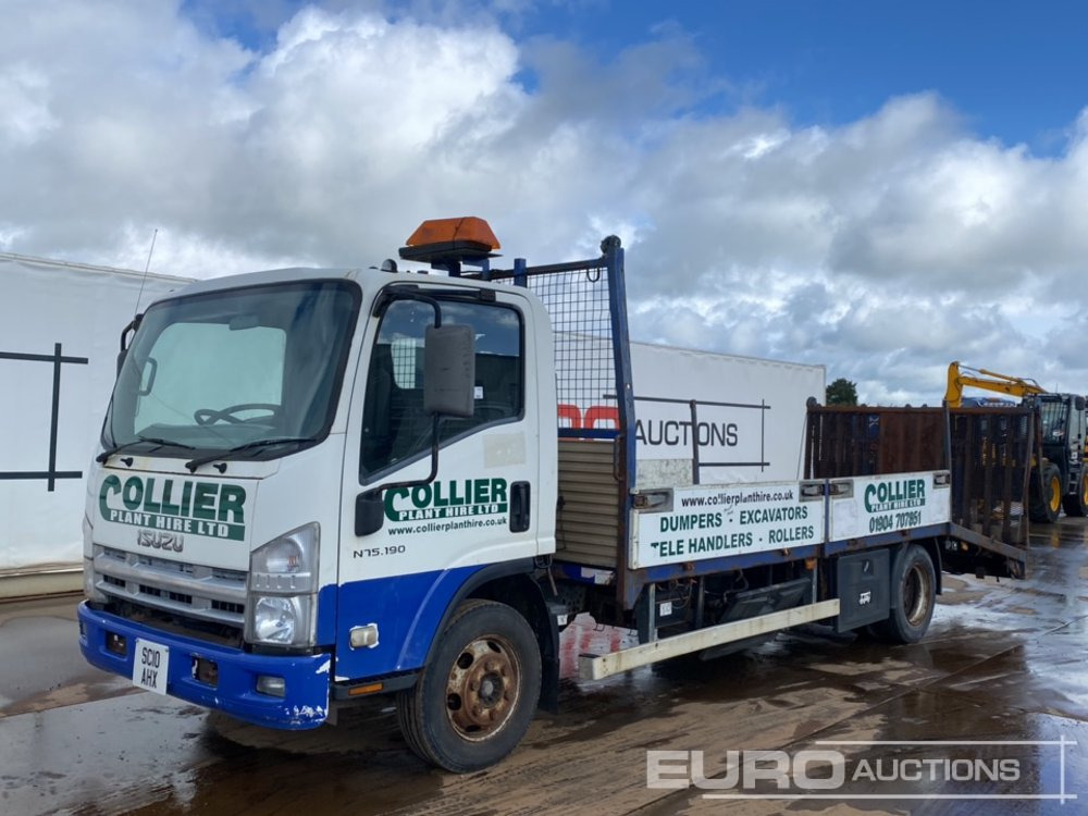 2010 Isuzu N75 - Camión caja abierta: foto 1 2010 Isuzu N75 - Camión caja abierta: foto 1