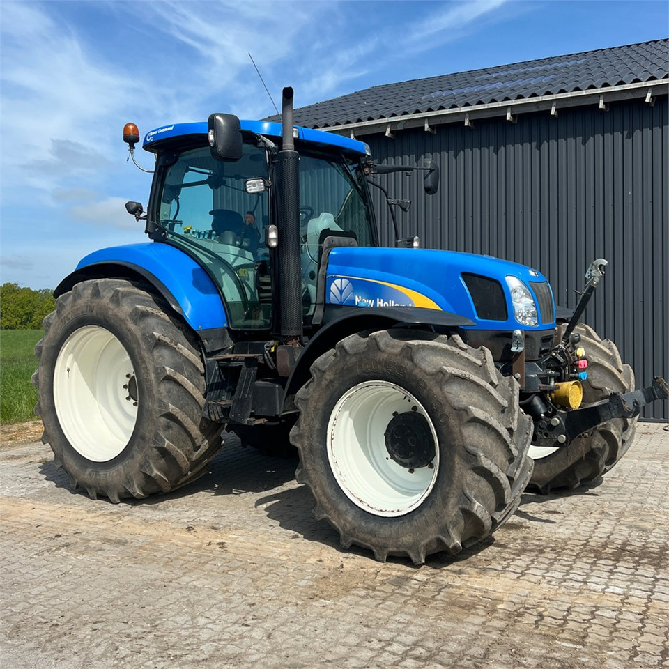 New Holland T6050 - Tractor: foto 2 New Holland T6050 - Tractor: foto 2