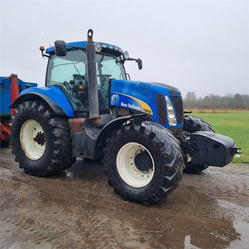 New Holland T8050 Class 5 - Tractor: foto 1 New Holland T8050 Class 5 - Tractor: foto 1